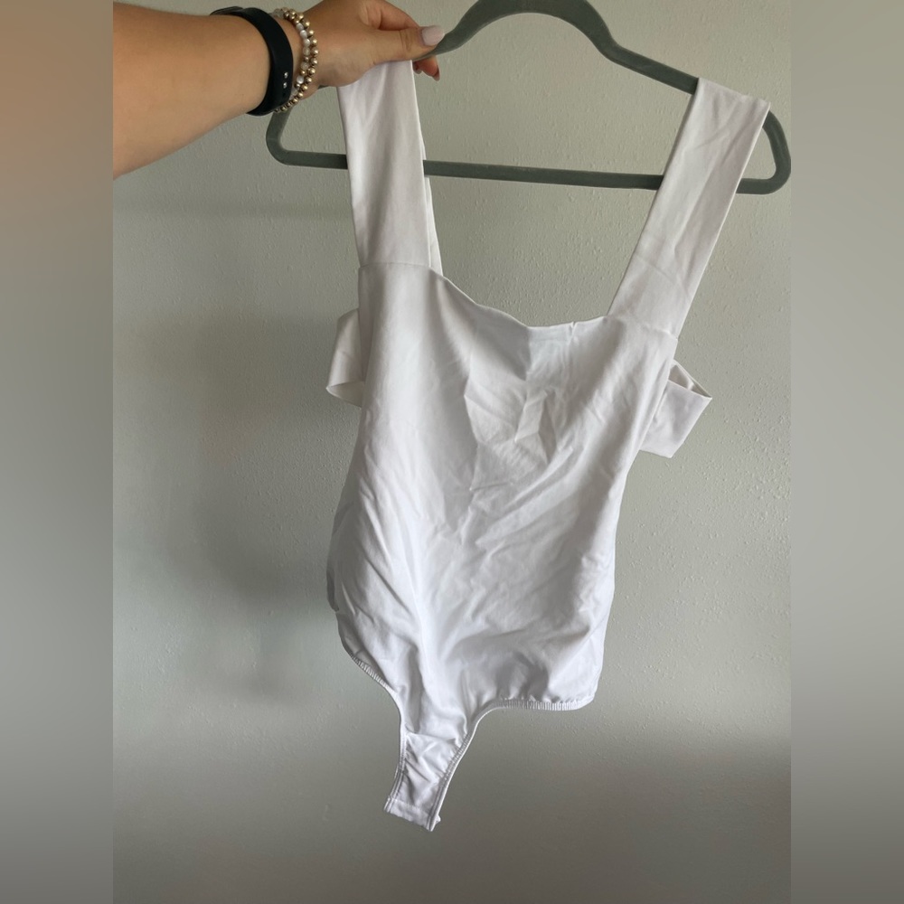 Open back white bodysuit never worn!
